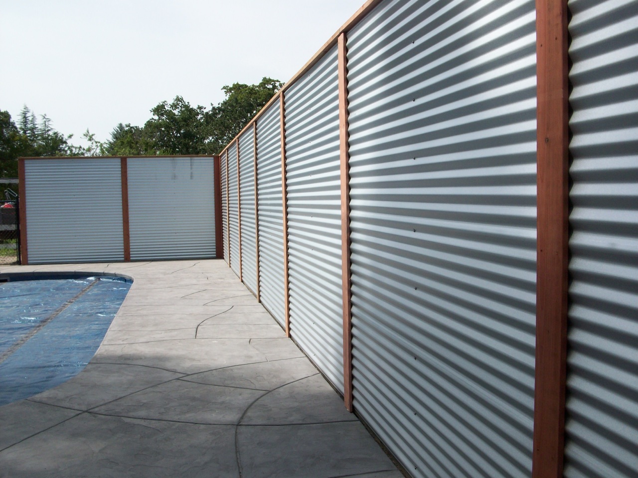 Tin fence on sale